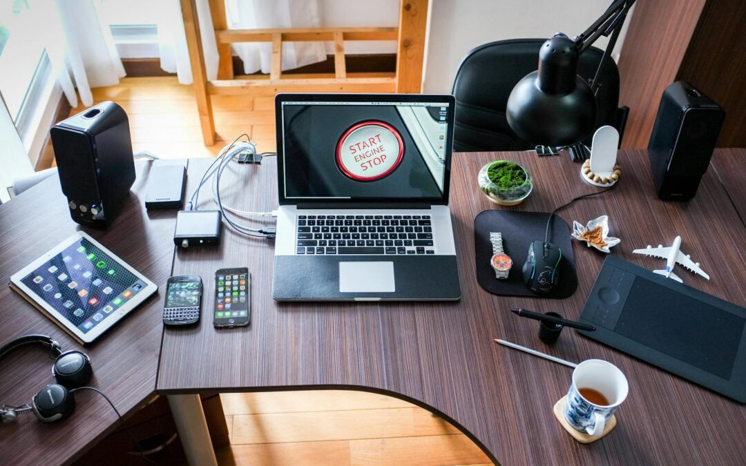 black and white laptop computer on brown wooden desk